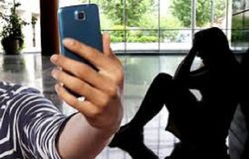 Husband Posts Wife's Photos on Social Media