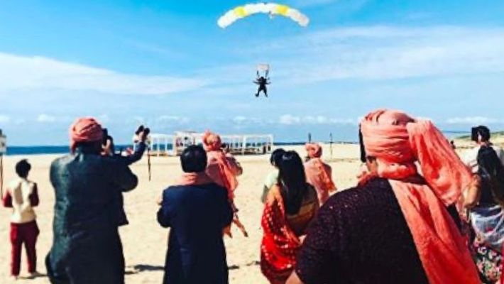 Image result for indian-groom-skydives-into-his-baraat-at-wedding-in-mexico