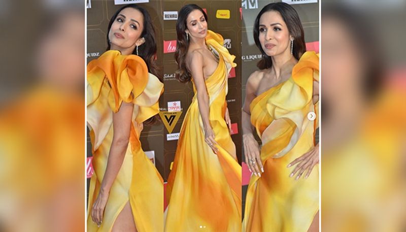 Malaika Arora suffers oops moment in this one-shoulder thigh-slit satin