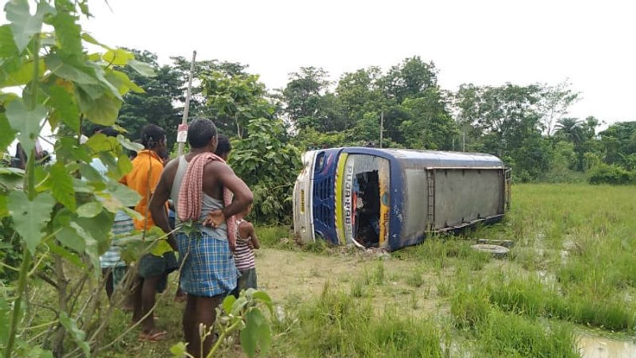 Bus overturns in Jhargram as driver fall unconscious Bus overturns in Jhargram as driver fall unconscious
