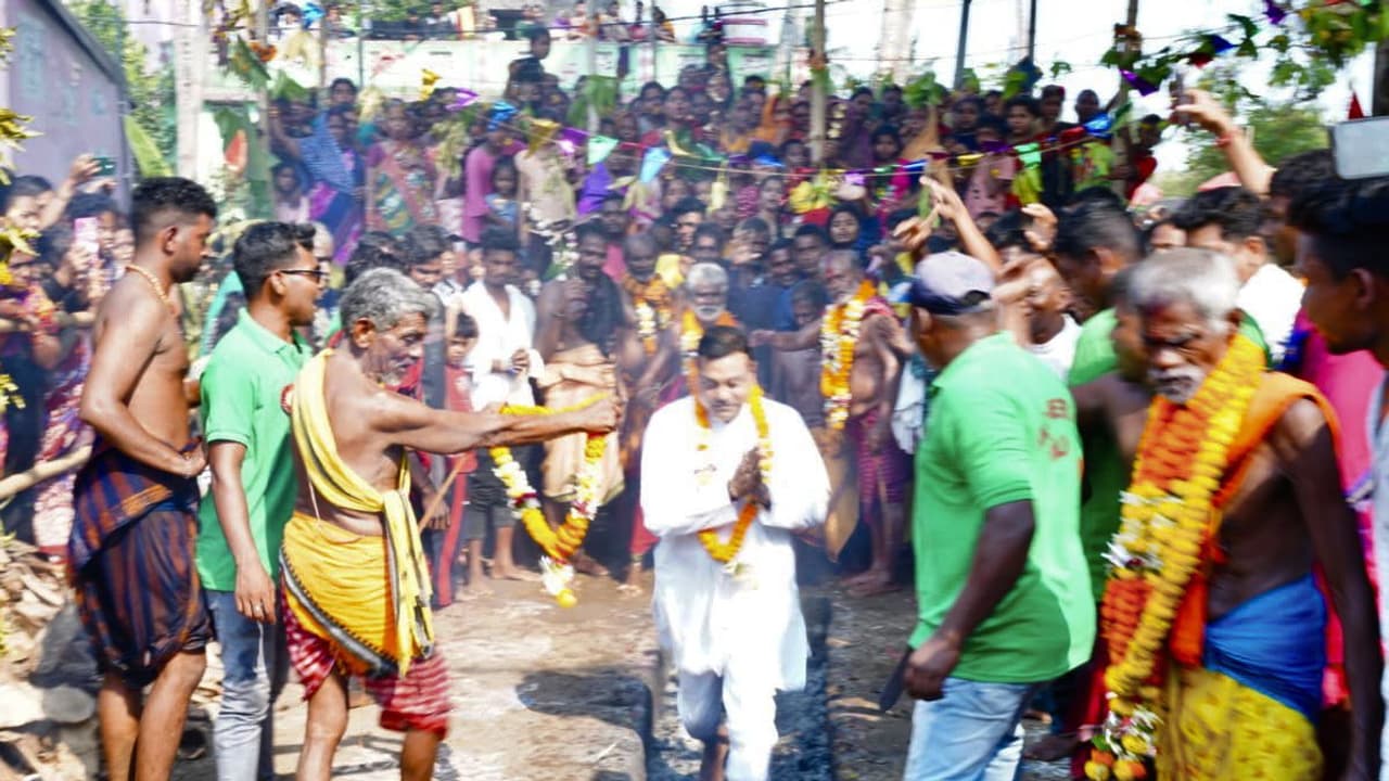 BJP leader Sambit Patra walked on burning coal BJP leader Sambit Patra walked on burning coal