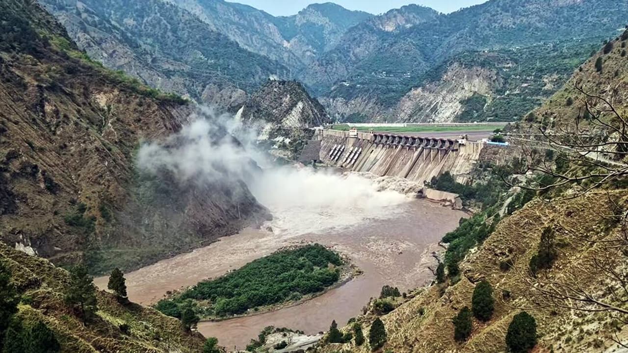 The gates of the Salal Dam open as the Chenab river swells up due to heavy rainfall The gates of the Salal Dam open as the Chenab river swells up due to heavy rainfall