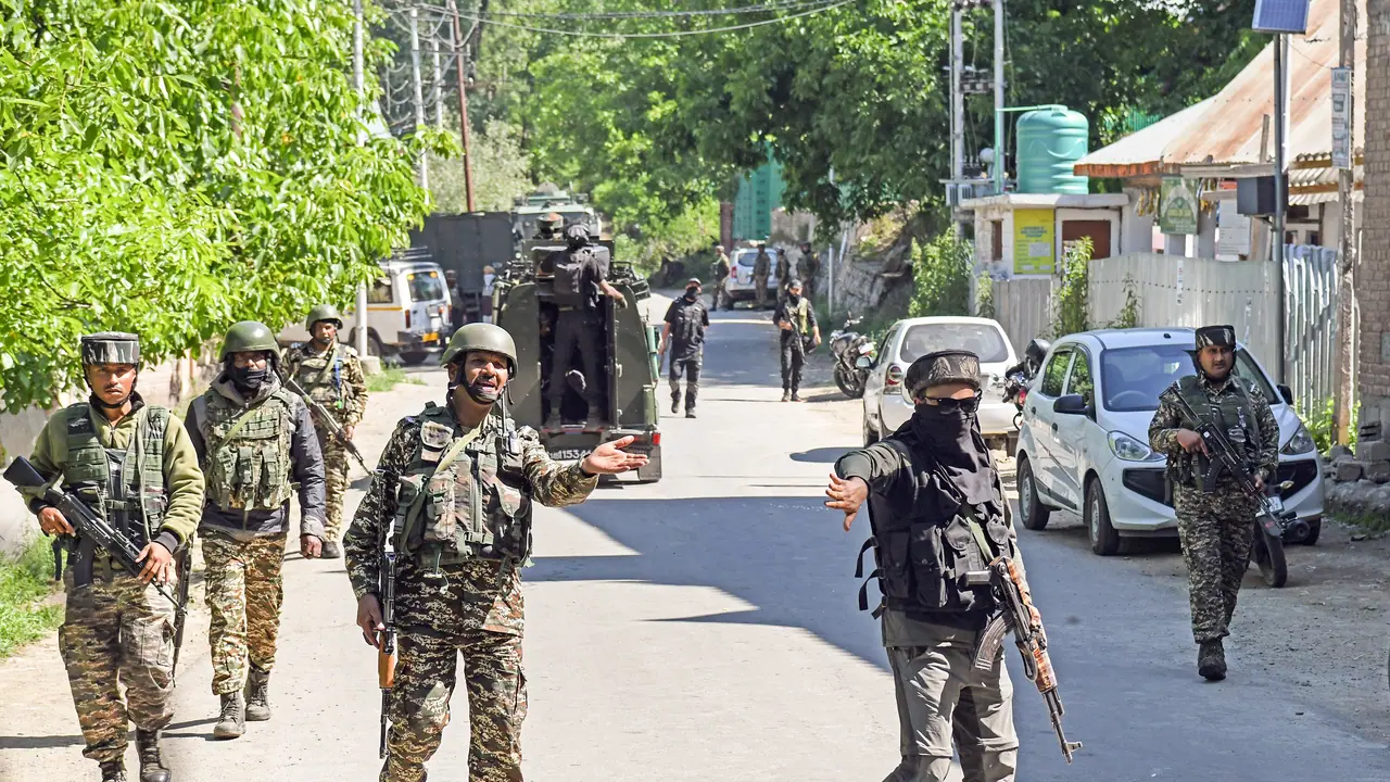 Security personnel carry out an encounter following inputs about the presence of terrorist at Nader, Tral area of Awantipora