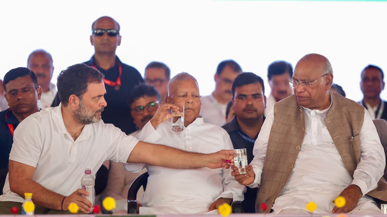 Rahul Gandhi along with Congress Party President Malikarjun Kharge and RJD Chief Lalu Prasad Yadav, during Voter Adhikar Rally Rahul Gandhi along with Congress Party President Malikarjun Kharge and RJD Chief Lalu Prasad Yadav, during Voter Adhikar Rally