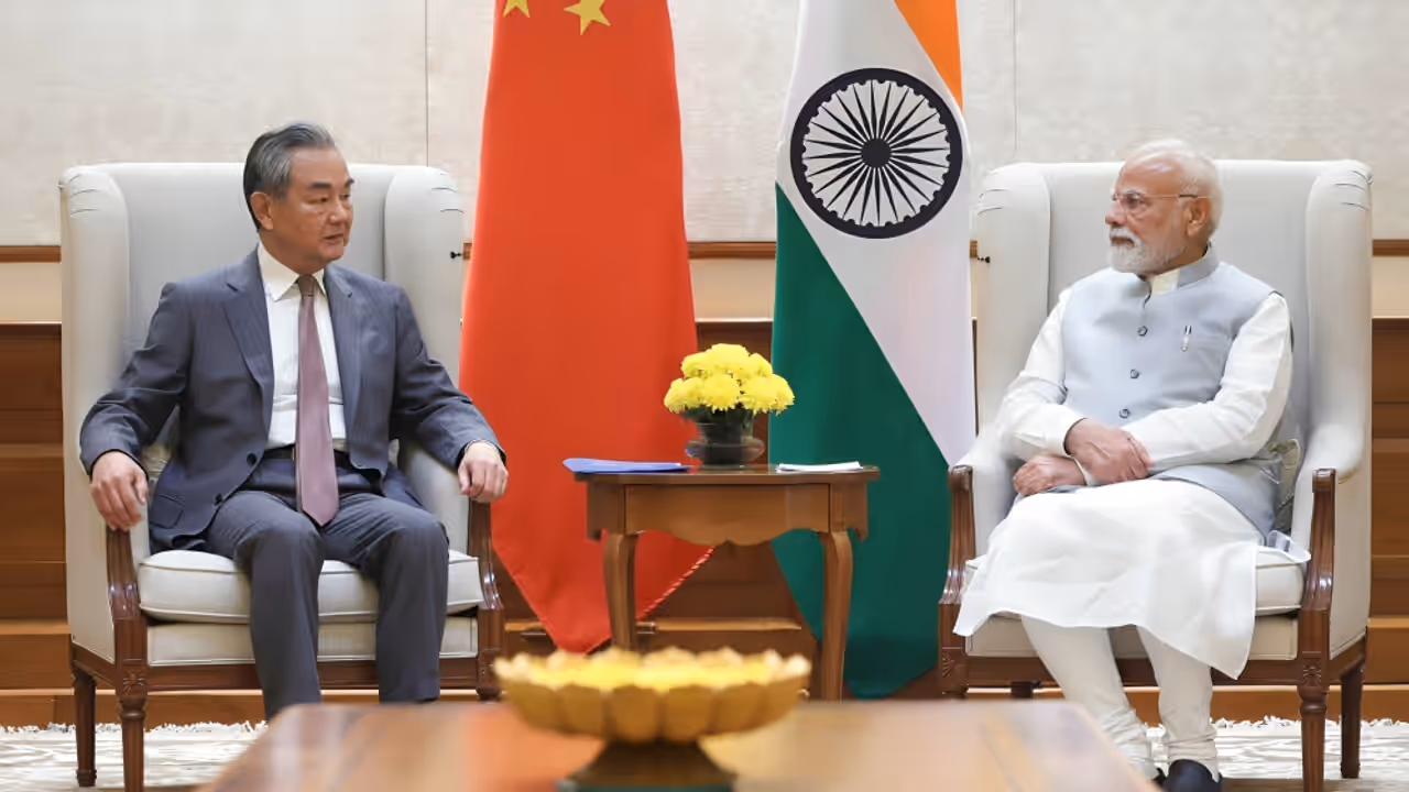 Wang Yi meets PM Narendra Modi