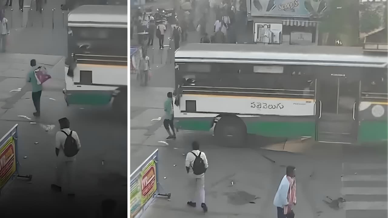 Vijayawada man crushed under APSRTC bus while crossing road CCTV shows pedestrian fatally hit while taking out phone Vijayawada man crushed under APSRTC bus while crossing road CCTV shows pedestrian fatally hit while taking out phone