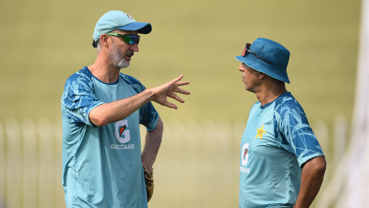 Jason Gillespie and Azhar Mahmood