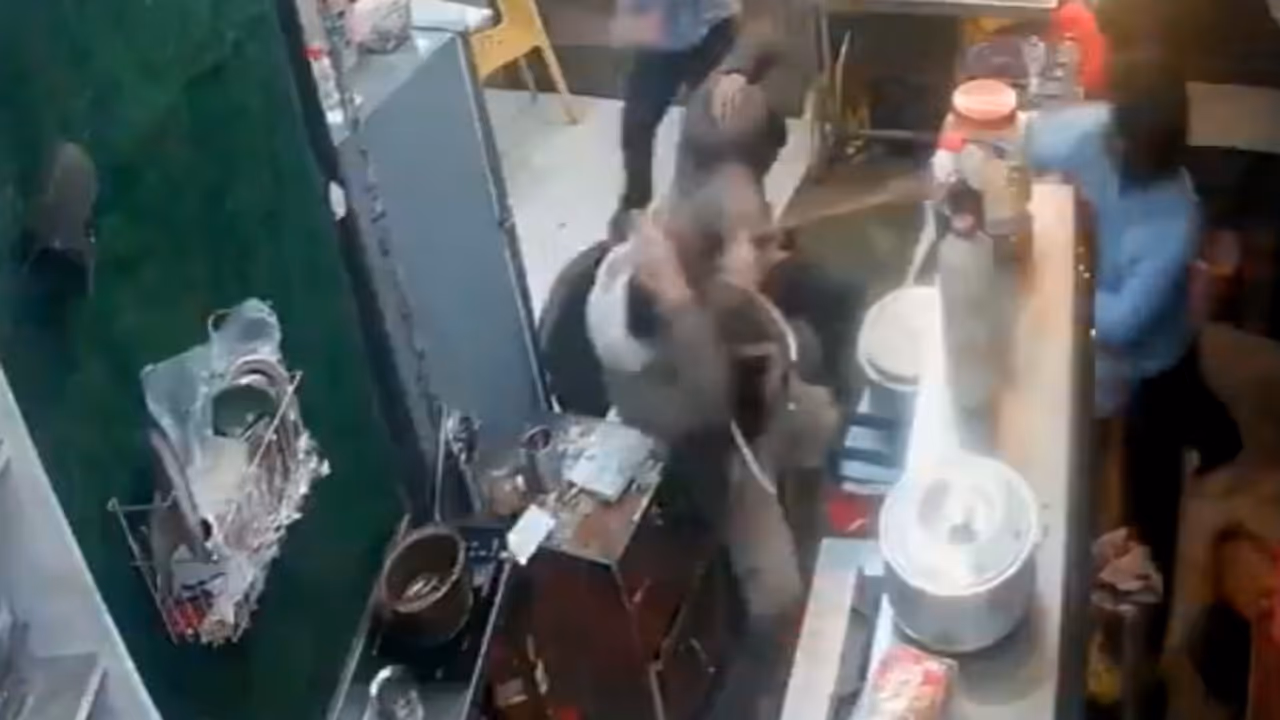 Watch: Stick Wielding Group Attacks Café Staff in Mussoorie, Clash Caught on CCTV Watch: Stick Wielding Group Attacks Café Staff in Mussoorie, Clash Caught on CCTV