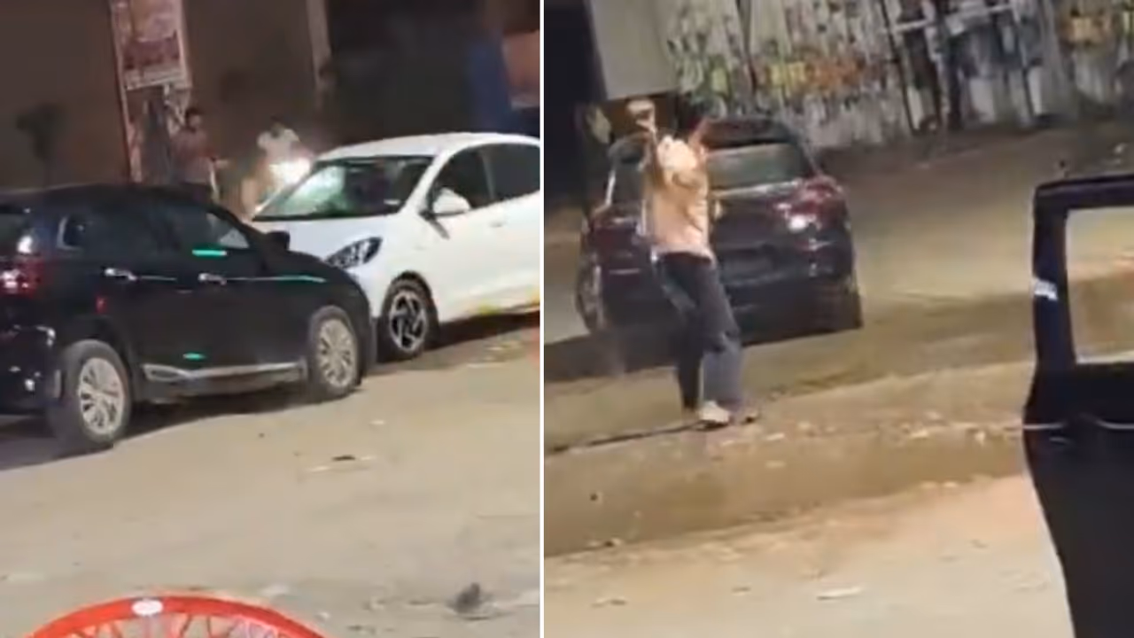 Gurugram Road Rage Viral Video: Two Cars Ram Each Other, Man Runs for Safety | WATCH Gurugram Road Rage Viral Video: Two Cars Ram Each Other, Man Runs for Safety | WATCH