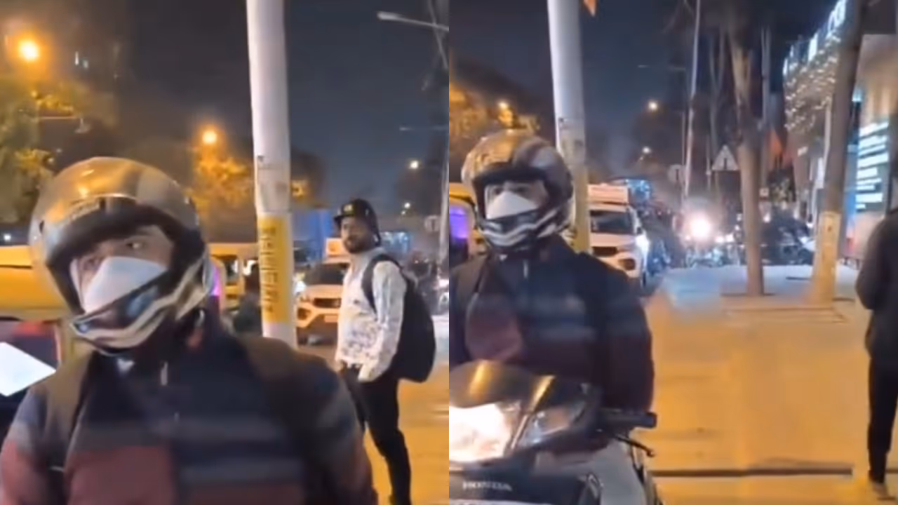 Two wheeler rider rides on footpath in Bengaluru’s Thanisandra area Two wheeler rider rides on footpath in Bengaluru’s Thanisandra area