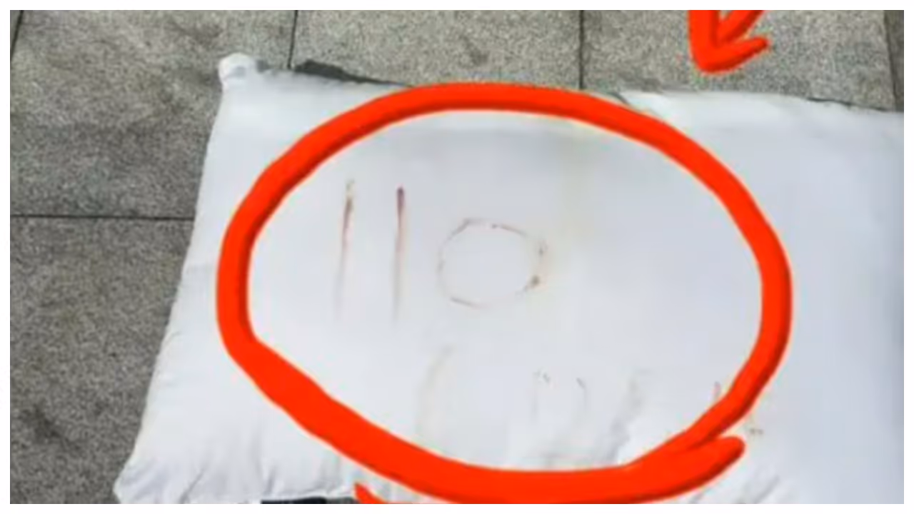 pillow written with 110 in blood