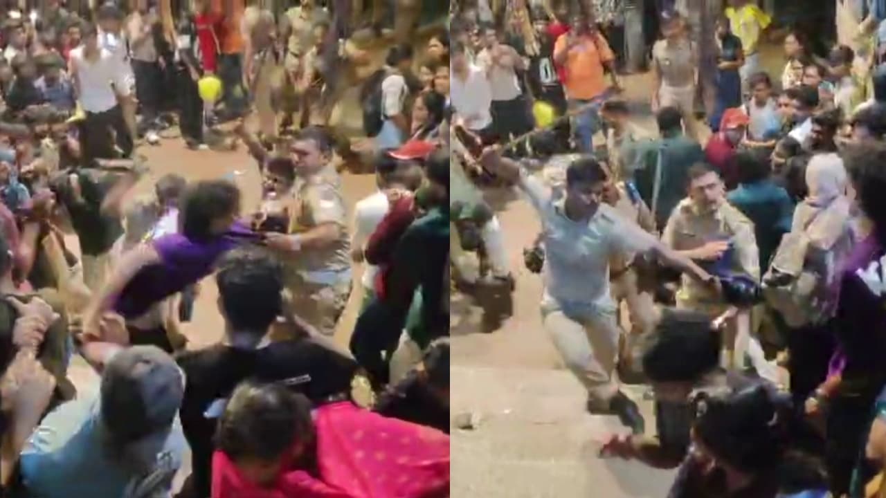 kerala police lathi charge