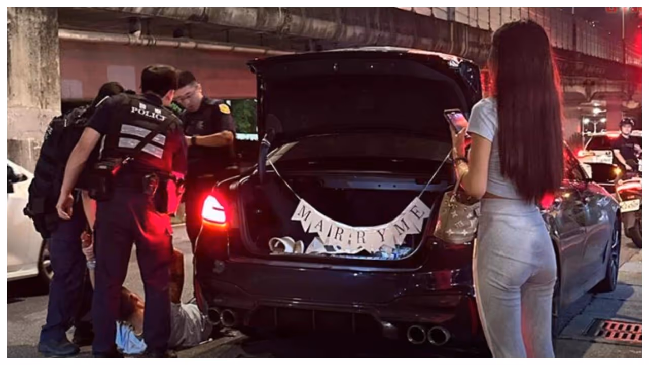 thai police arrest a man in the middle of a proposal