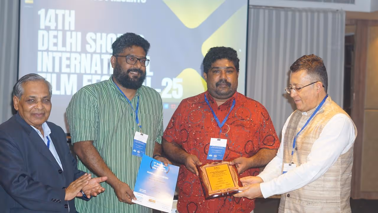 Honey RK receiving award for Edited