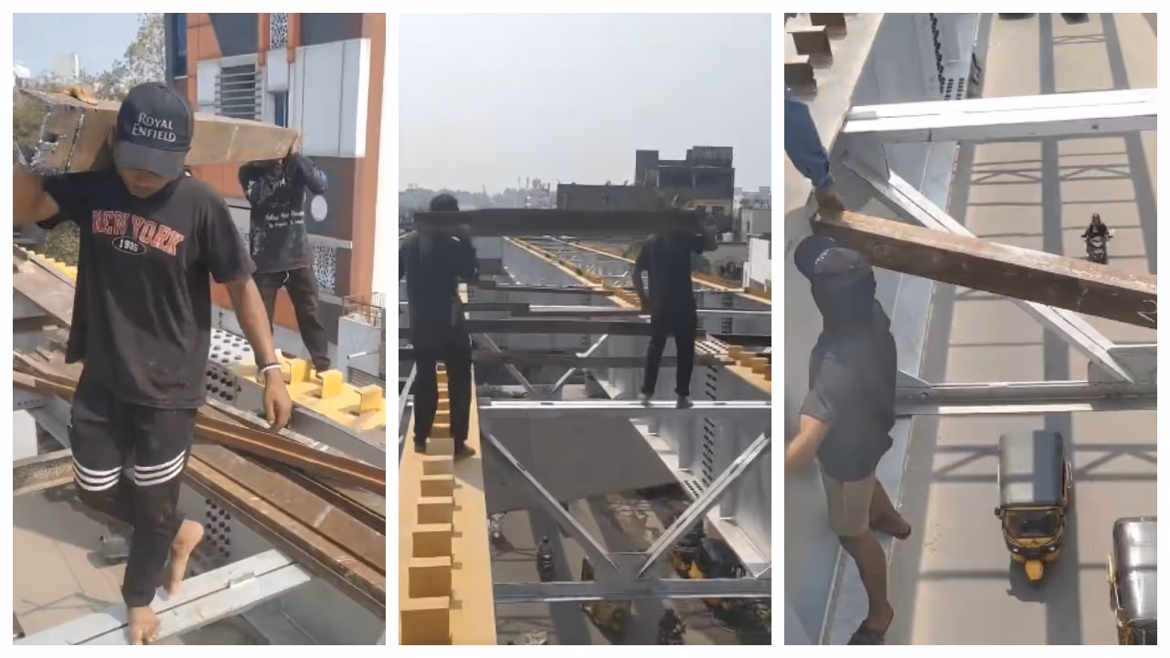 Workers Carry Heavy Iron Rods Over Busy Traffic Workers Carry Heavy Iron Rods Over Busy Traffic