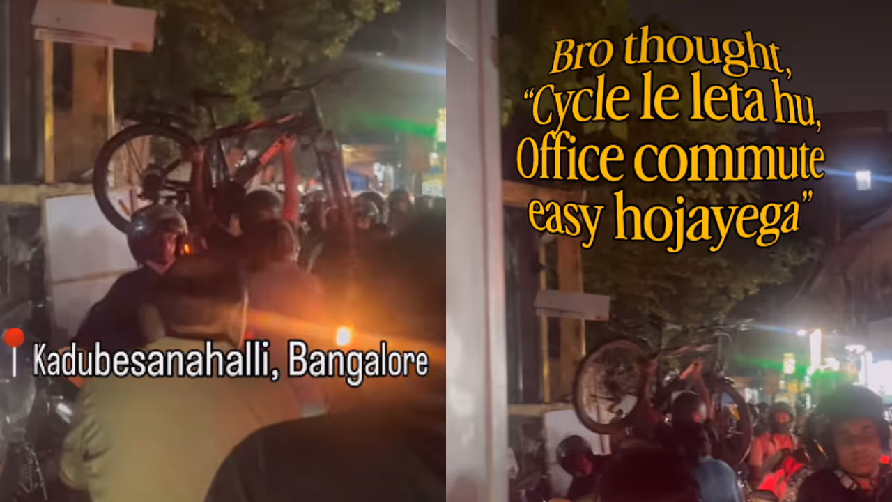 Cyclist carries bicycle through Bengaluru traffic gridlock Cyclist carries bicycle through Bengaluru traffic gridlock