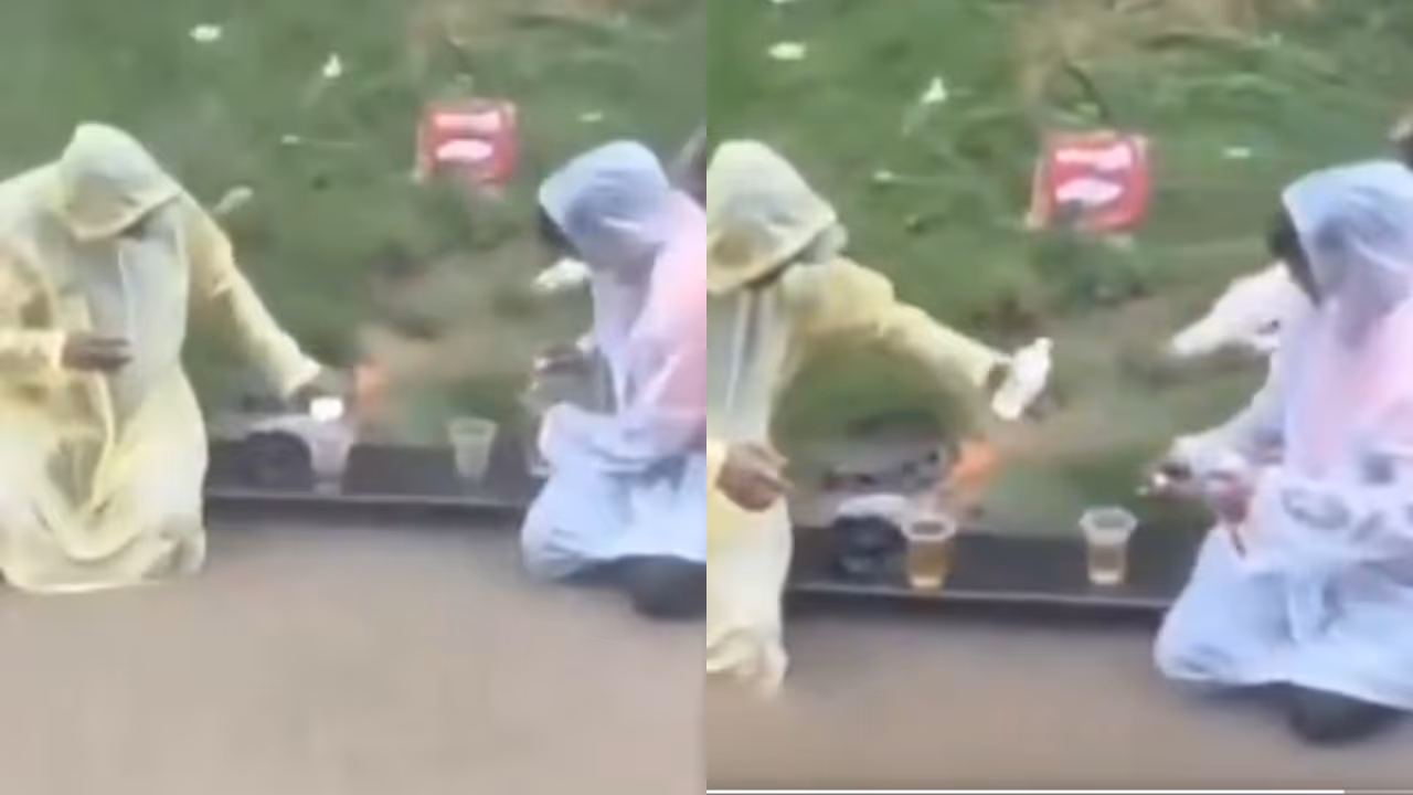 Two Friends Enjoying Drinks Amid Mumbai Rains Two Friends Enjoying Drinks Amid Mumbai Rains