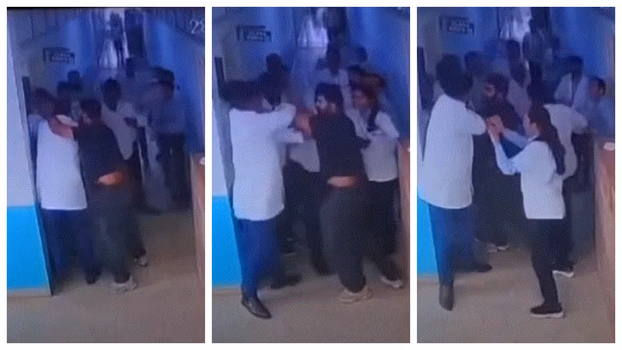 father beating teacher in Maharashtra father beating teacher in Maharashtra