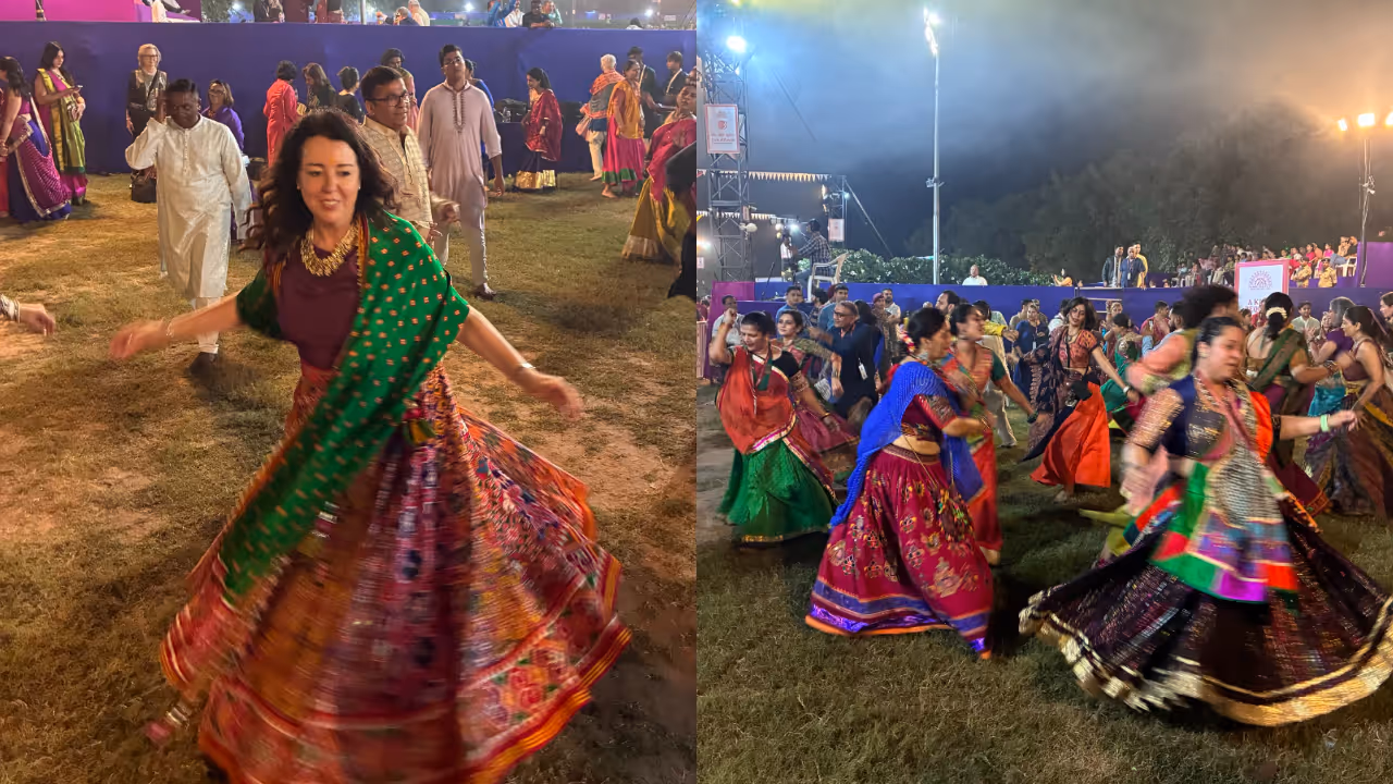 Swiss envoy plays Garba Swiss envoy plays Garba