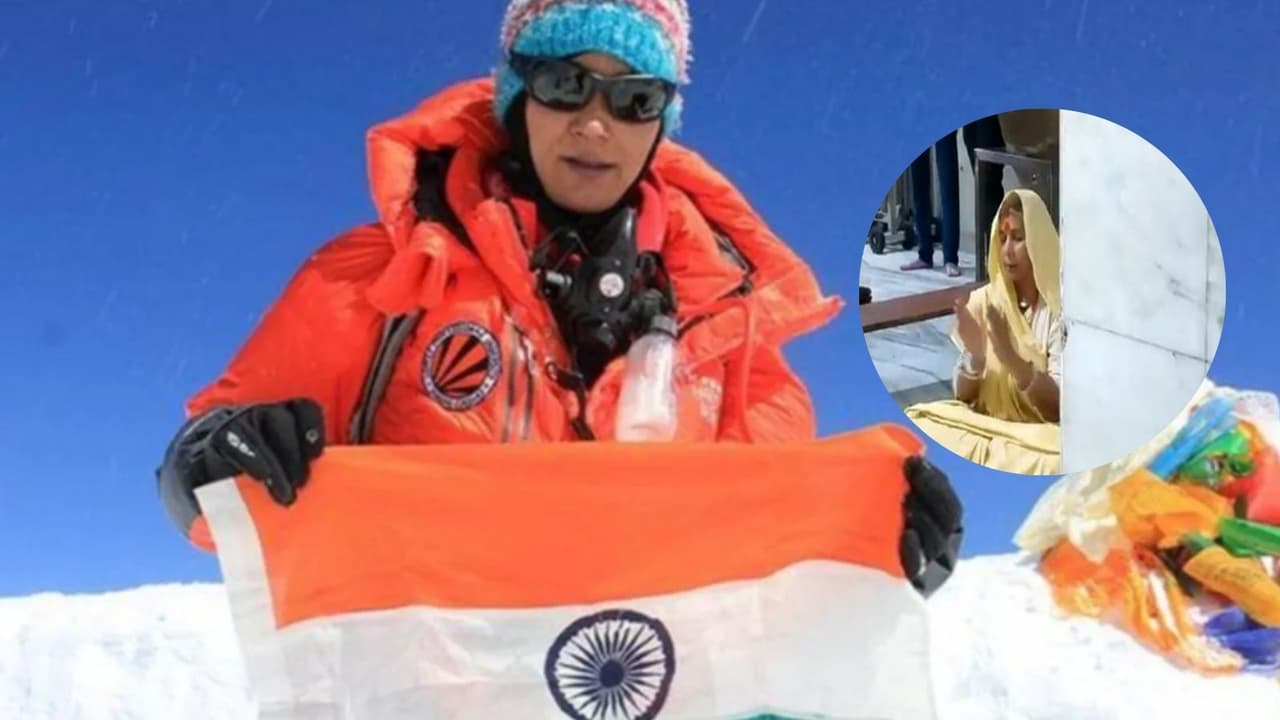 Indian Mountaineer and Mount Everest climber Santosh Yadav offers prayers at Shri Mahakaleshwar