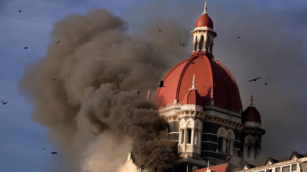 Smoke belching out from below the main Dom of Taj Hotel in Mumbai during 26/11 terror attacks Smoke belching out from below the main Dom of Taj Hotel in Mumbai during 26/11 terror attacks