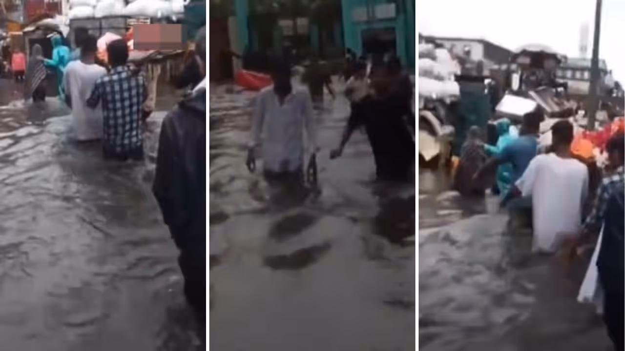 Gujarat floods amid rain Surat viral video shows family carrying body through flooded streets Gujarat floods amid rain Surat viral video shows family carrying body through flooded streets