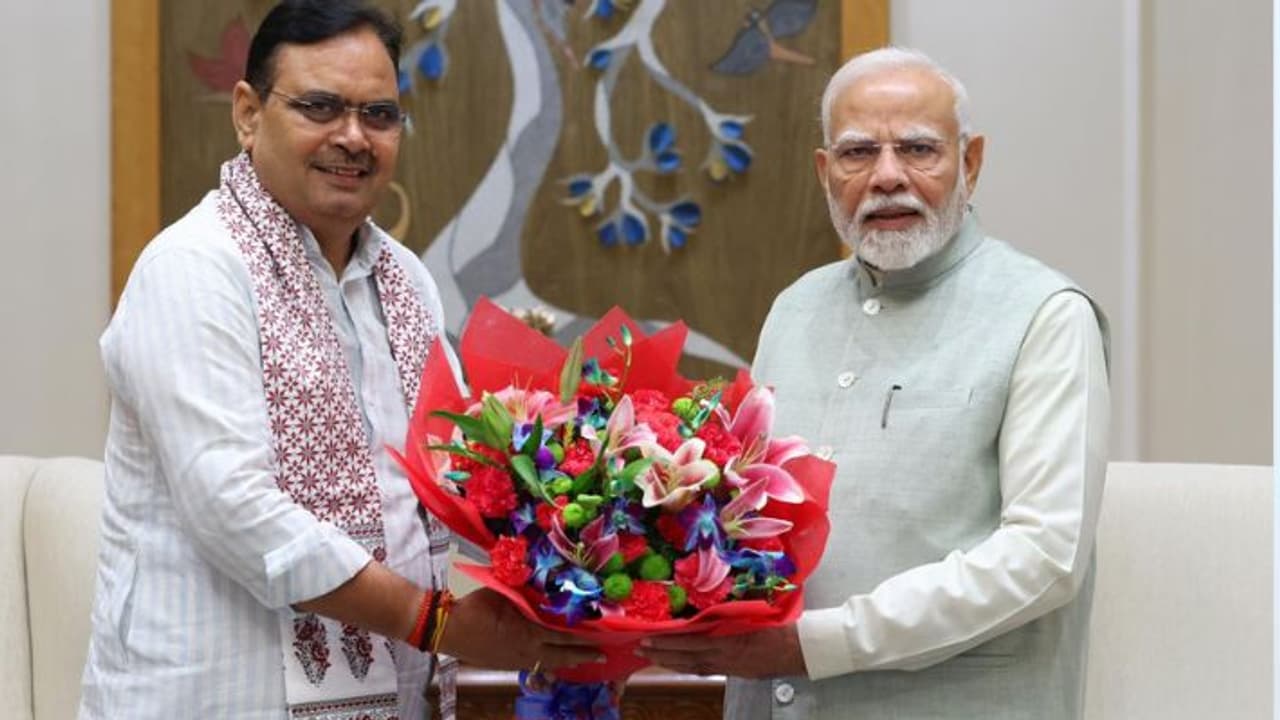 PM Modi with Bhajanlal Sharma PM Modi with Bhajanlal Sharma
