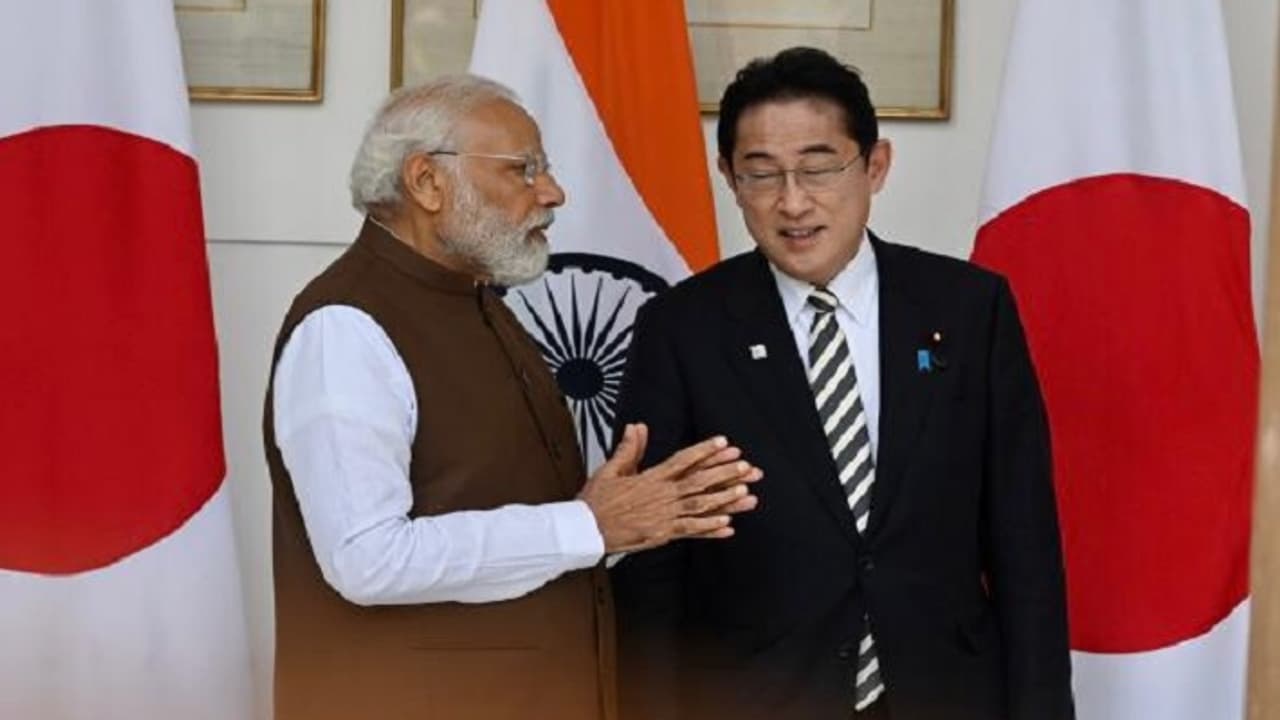 Narendra Modi with Fumio Kishida Narendra Modi with Fumio Kishida