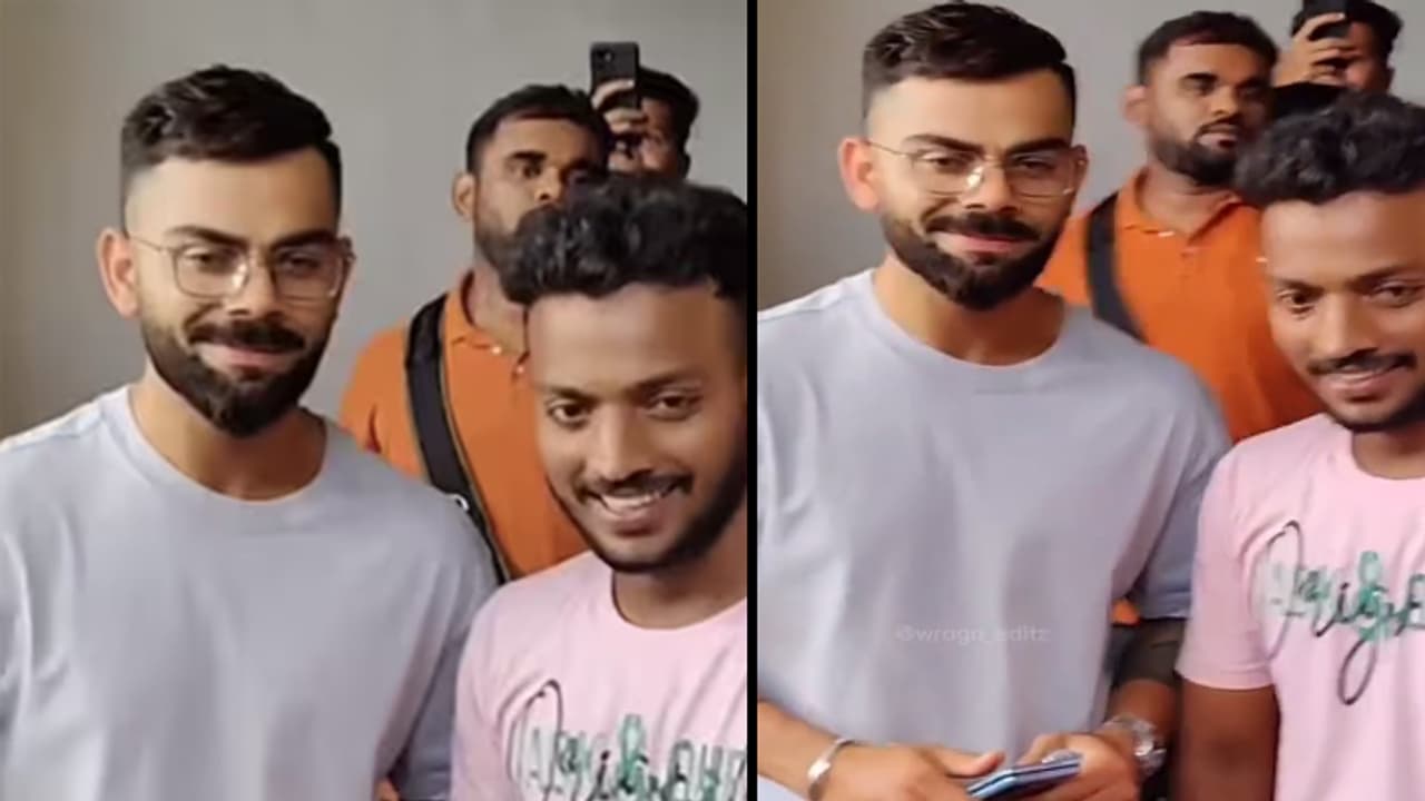 Virat Kohli picture with fan Virat Kohli picture with fan