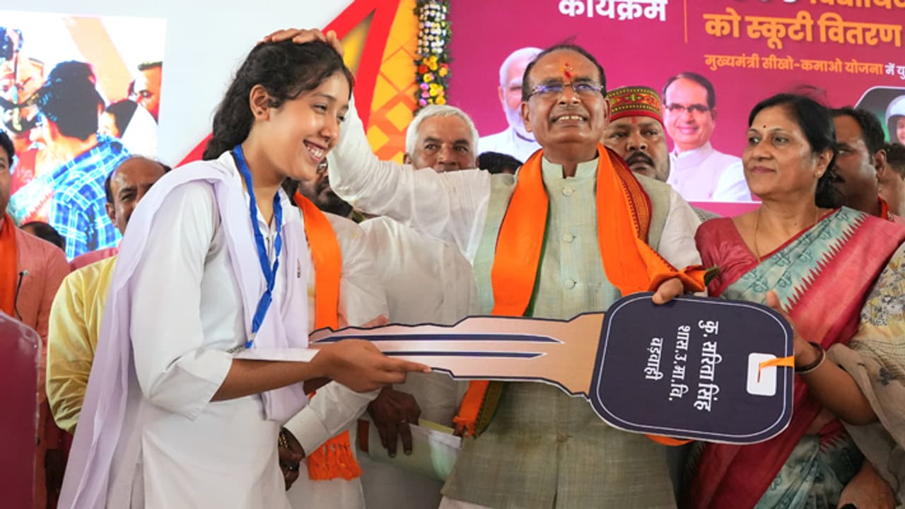 shivraj singh chouhan gifted scooty to topper students in shahdol shivraj singh chouhan gifted scooty to topper students in shahdol