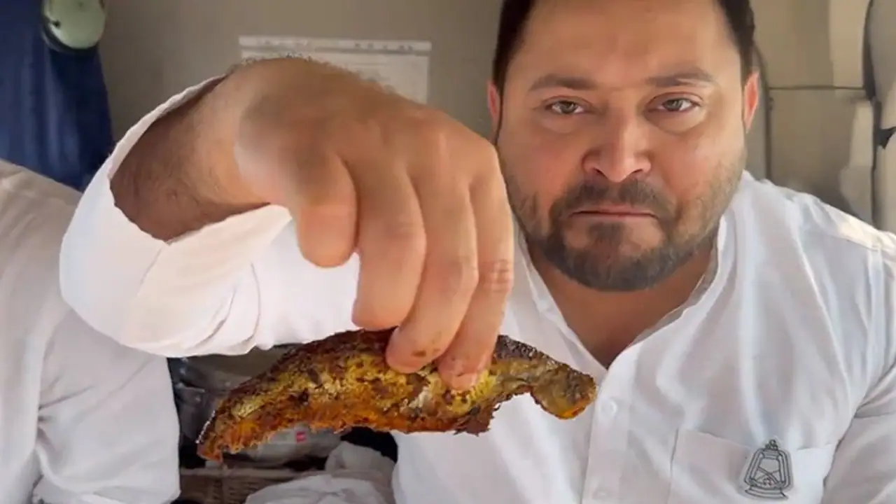 Tejashwi Yadav eats fish in helicopter