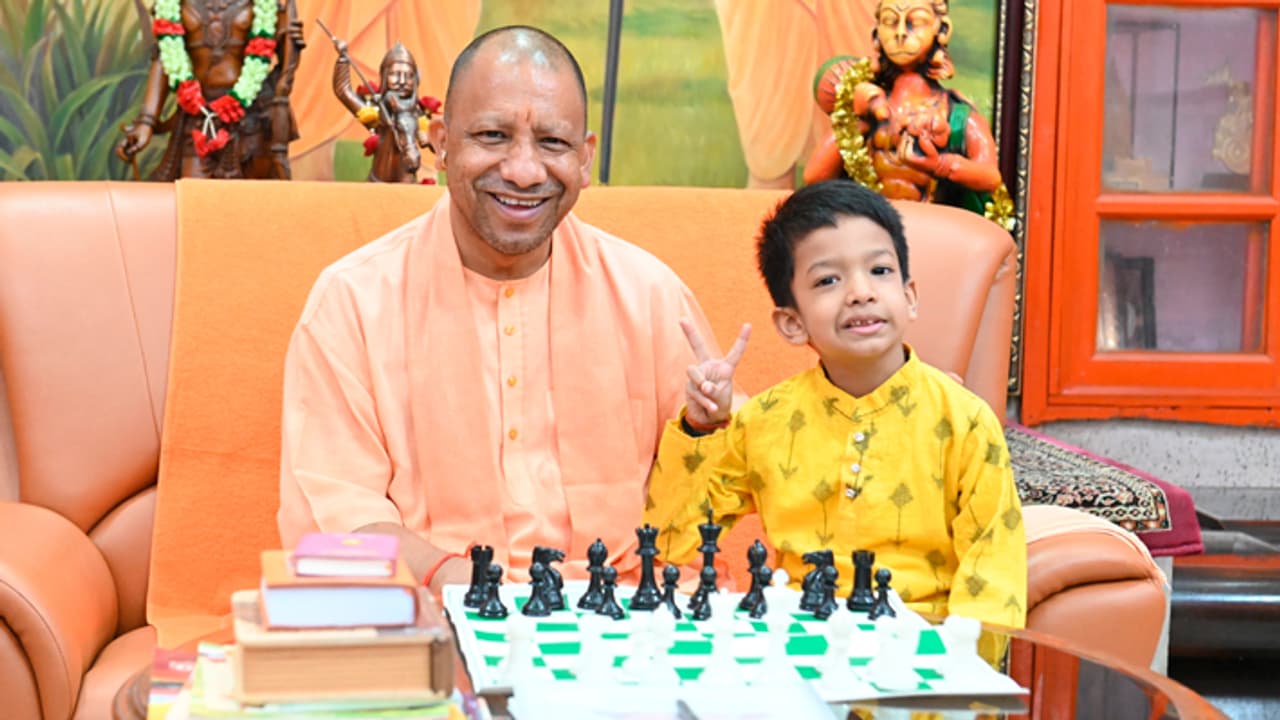 Yogi Adityanath plays chess with Kushagra Agrawal the youngest FIDE rated player Yogi Adityanath plays chess with Kushagra Agrawal the youngest FIDE rated player