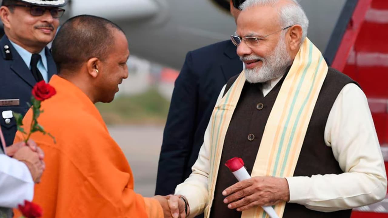 Yogi Adityanath congratulates PM Modi on 23 years of exemplary service as Chief Minister and Prime Minister Yogi Adityanath congratulates PM Modi on 23 years of exemplary service as Chief Minister and Prime Minister