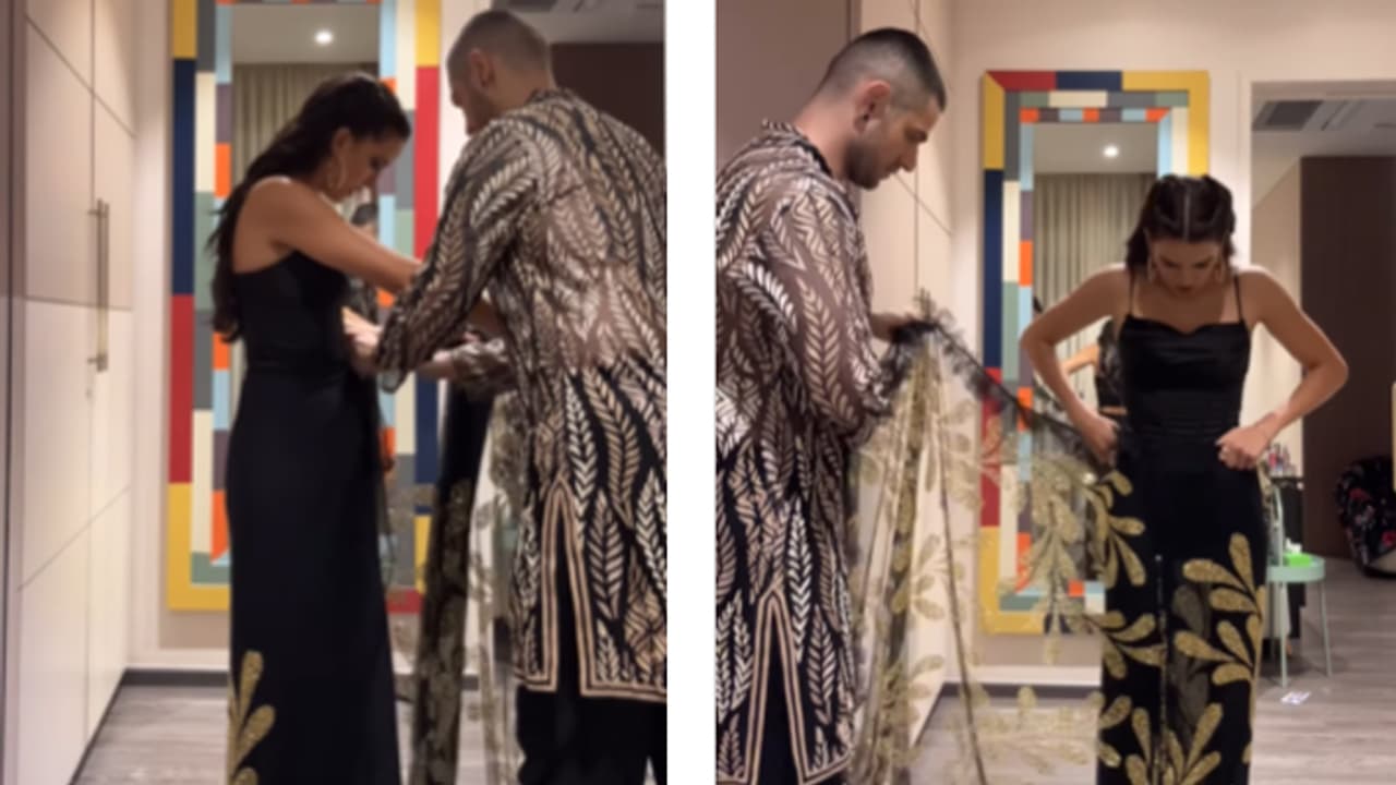 Natasa stankovic friend Alexander helping her to wear saree Natasa stankovic friend Alexander helping her to wear saree