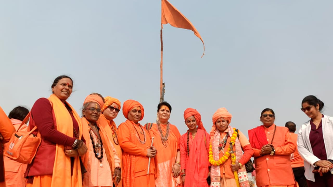 Three Akharas installed the religious flag of their respective Akharas in the Prayagraj Maha Kumbh 2025 area Three Akharas installed the religious flag of their respective Akharas in the Prayagraj Maha Kumbh 2025 area
