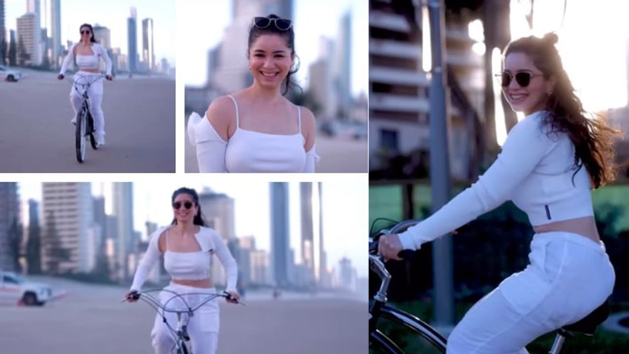 sara tendulkar in australia watch her cycling video on her Instagram post looking gorgeous in white dress 