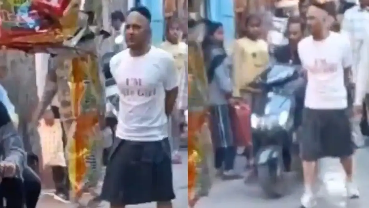 Haryana cops parade extortion accused in skirt Haryana cops parade extortion accused in skirt