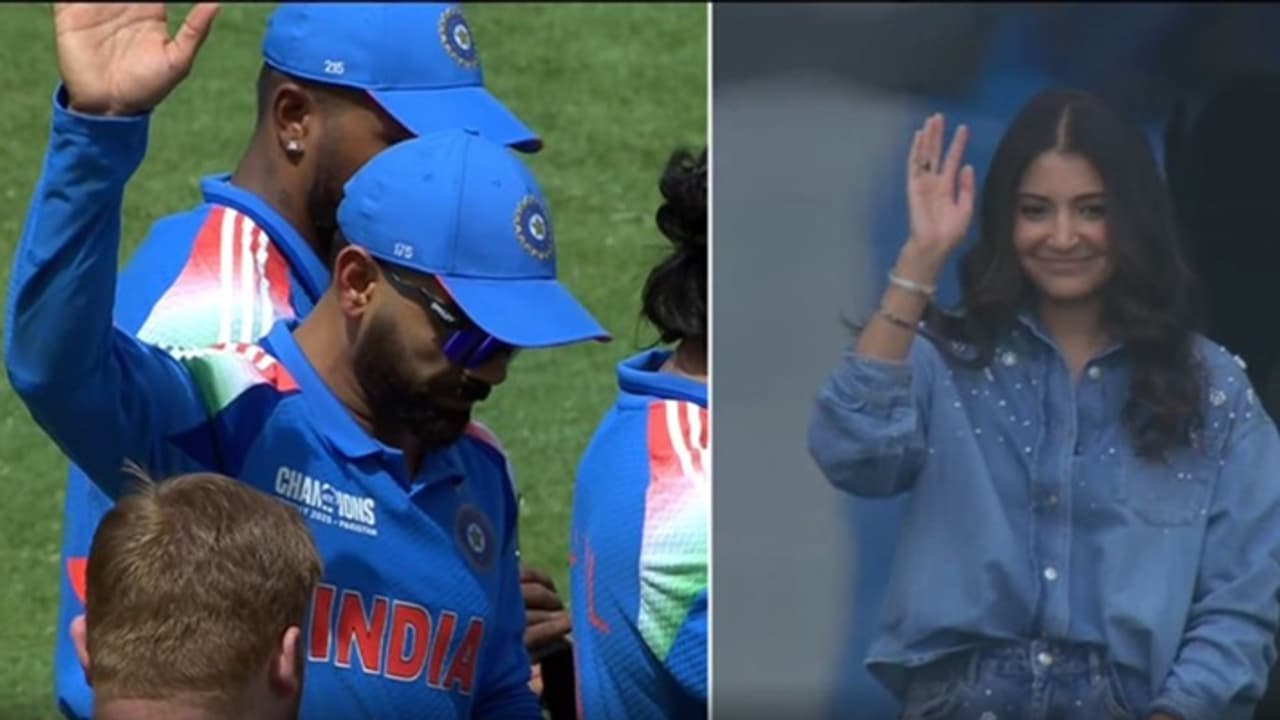 Virat Kohli waves at Anushka Sharma
