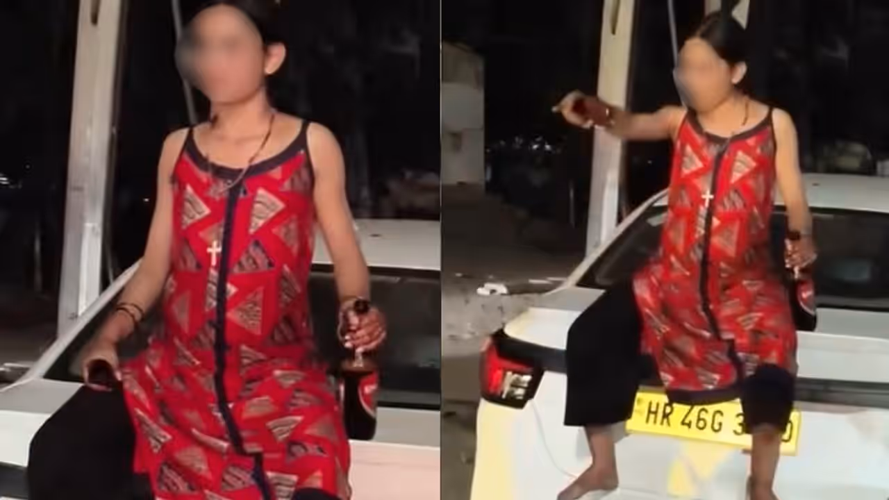 Haryana Road Drama: 'Drunk' Woman Allegedly Throws Liquor At Ola Driver, Sits On Car | WATCH Viral Video Haryana Road Drama: 'Drunk' Woman Allegedly Throws Liquor At Ola Driver, Sits On Car | WATCH Viral Video