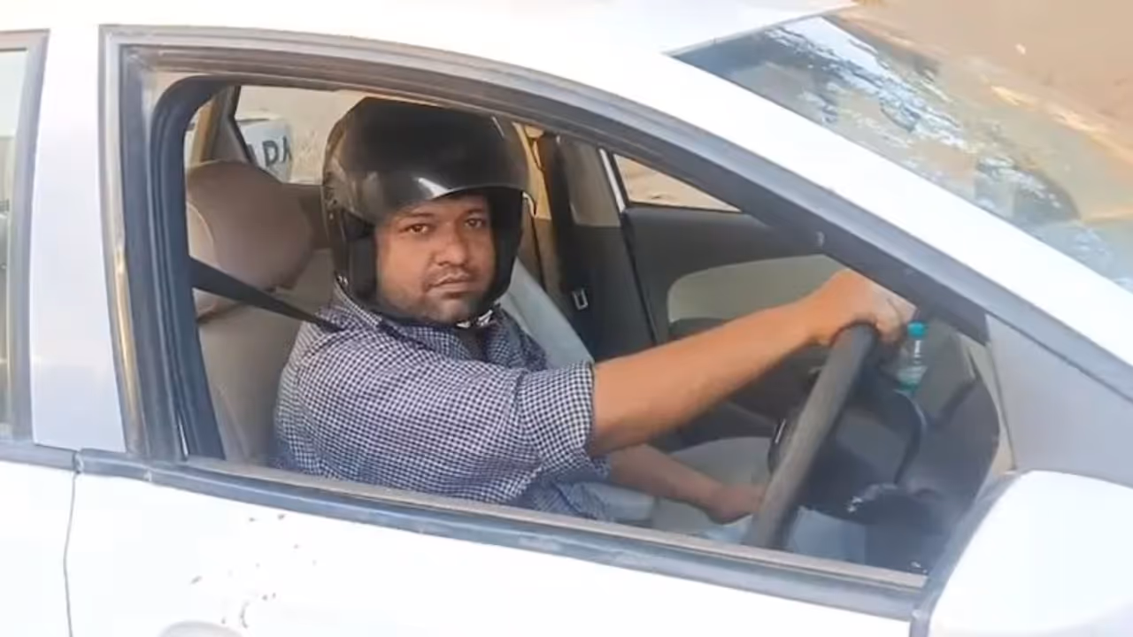 UP Man Drives Car Wearing Helmet