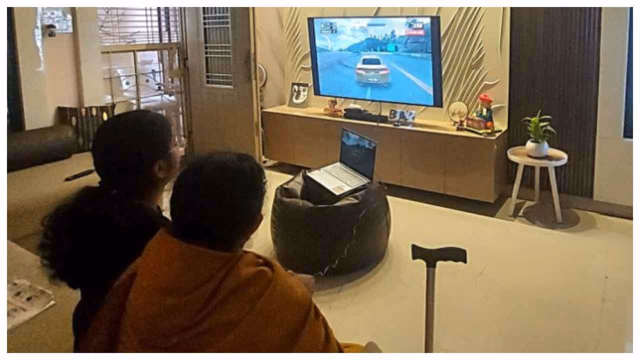 grandmother taught by her Grandchild to play video game grandmother taught by her Grandchild to play video game