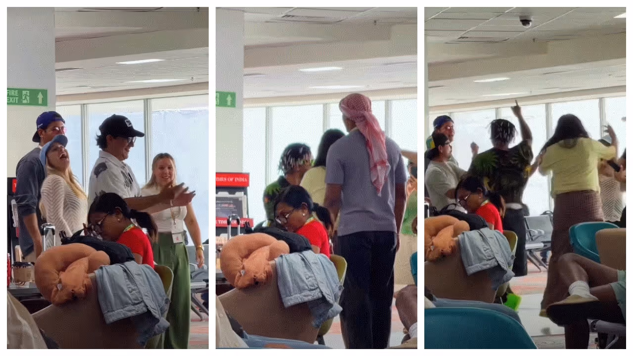 Foreigners sing and dance at Delhi airport Foreigners sing and dance at Delhi airport
