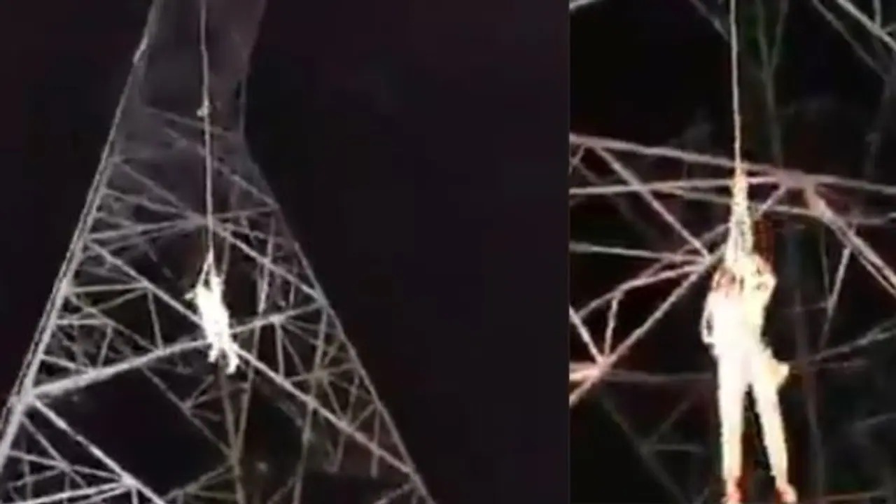 Man Climbs 40ft High Transmission Line