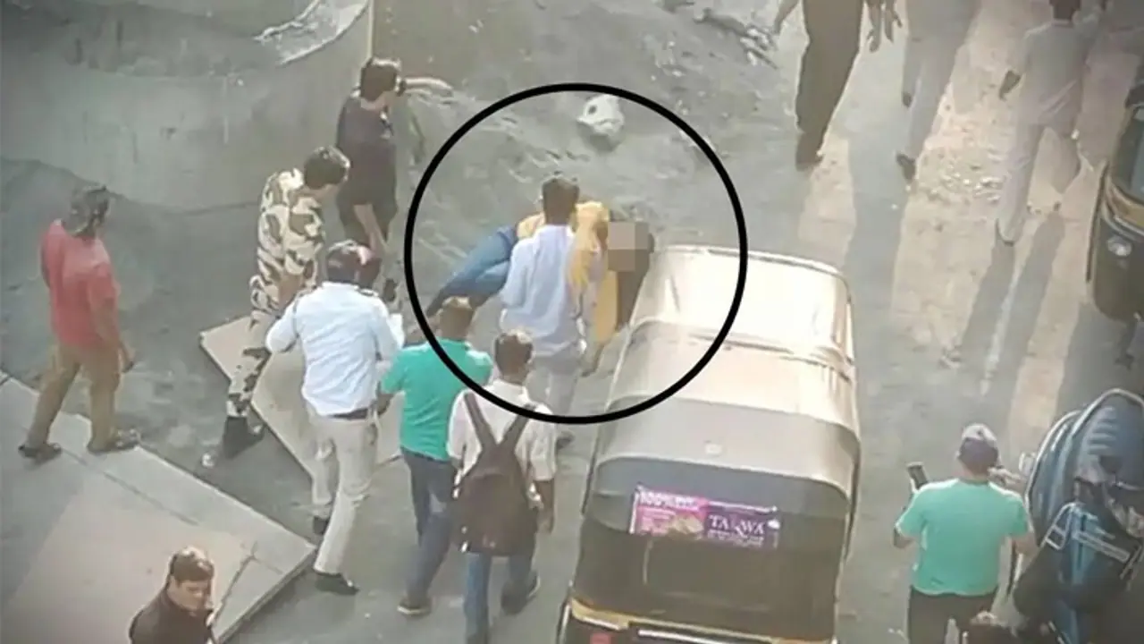 A woman and her baby falling from the bridge connecting Bhayandar A woman and her baby falling from the bridge connecting Bhayandar
