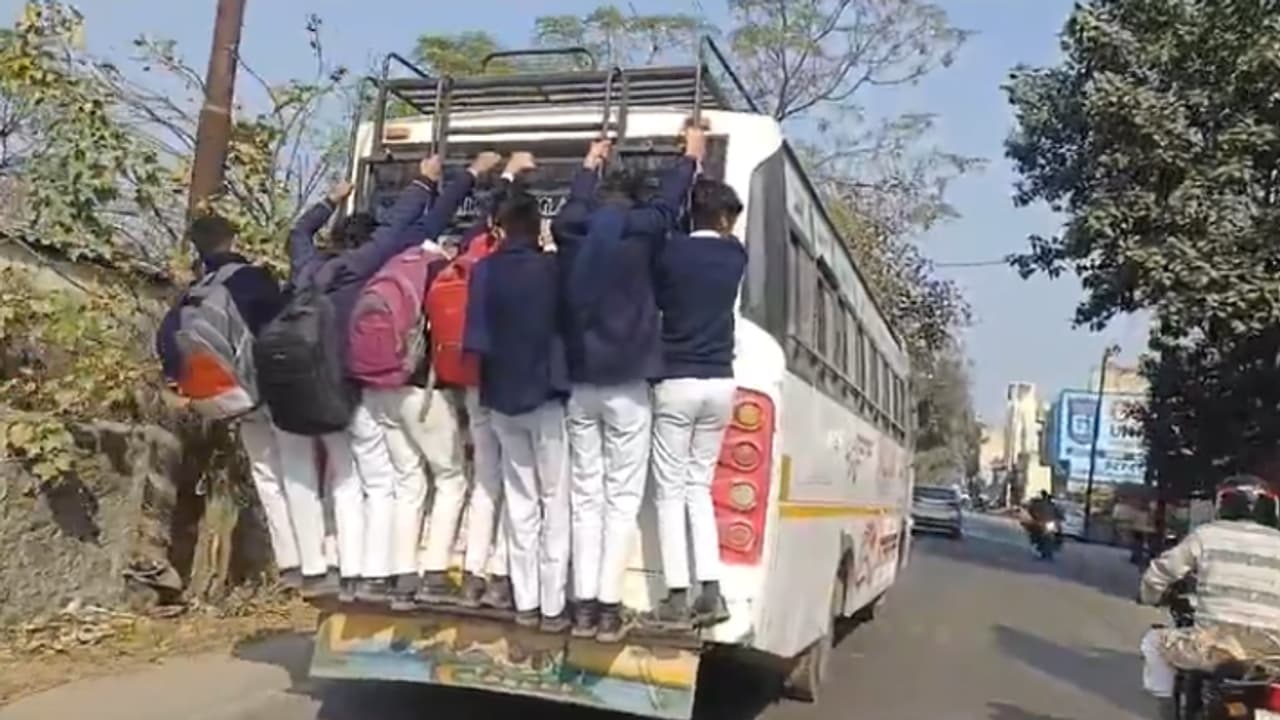 up shamli bus operator violating traffic rules students hanging back viral video traffic police up shamli bus operator violating traffic rules students hanging back viral video traffic police