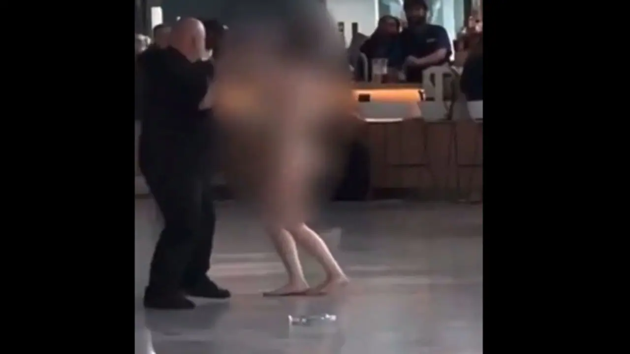 Naked woman on Airport