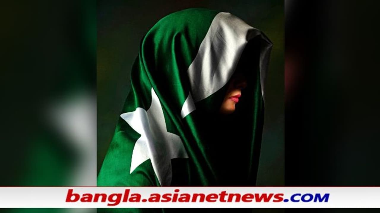 Woman veiled in Pakistani national flag Woman veiled in Pakistani national flag