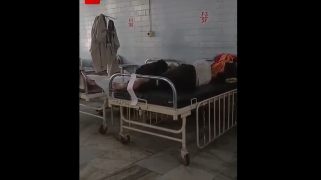 Drunk MP Cops Suspended After Viral Video Shows Them Sleeping on Patient Bed Drunk MP Cops Suspended After Viral Video Shows Them Sleeping on Patient Bed