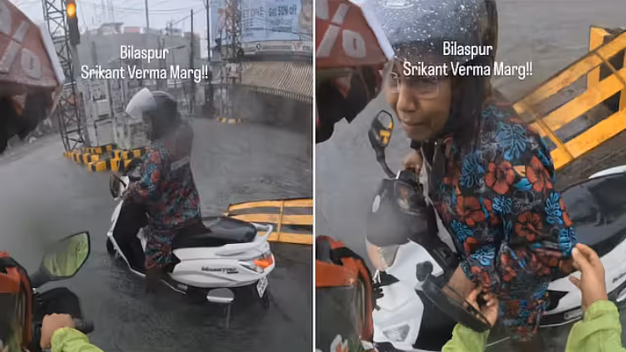 Watch: Man Calmly Helps Woman Cross Flooded Bilaspur Road, Viral Video Wins Hearts Watch: Man Calmly Helps Woman Cross Flooded Bilaspur Road, Viral Video Wins Hearts