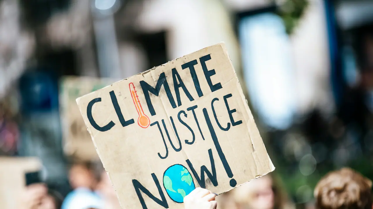 CLIMATE JUSTICE NOW. Global climate change strike protest demonstration No Planet B CLIMATE JUSTICE NOW. Global climate change strike protest demonstration No Planet B